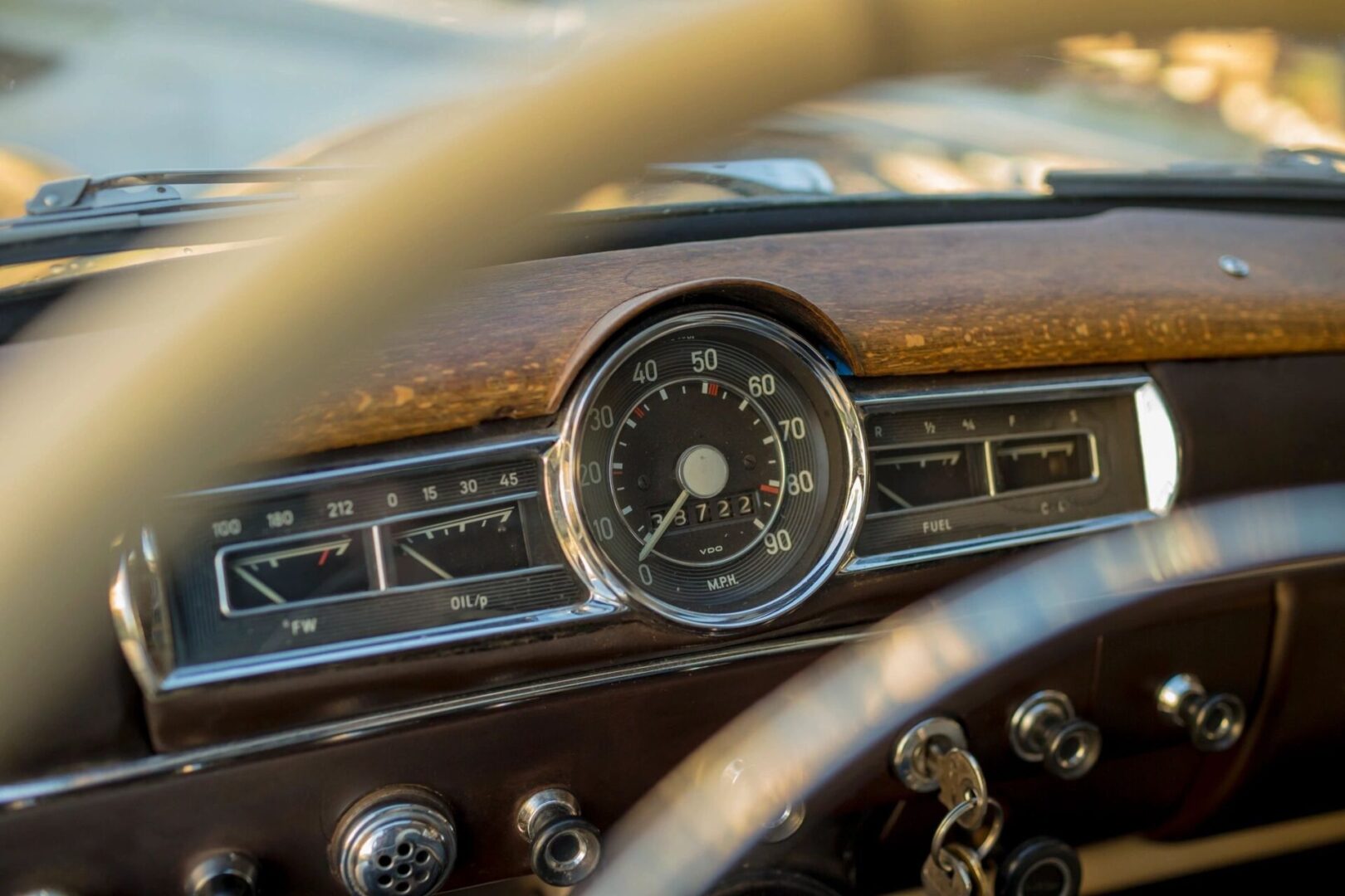 A close up of the dashboard and steering wheel